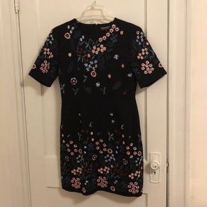 Black dress with floral embroidery